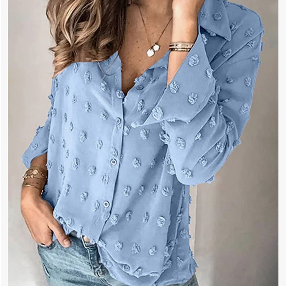Light blue Pom Pom button down blouse.
